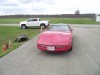 Little Red Vette with Father and Daughter